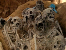 close-up-of-mass-grave-skeltons